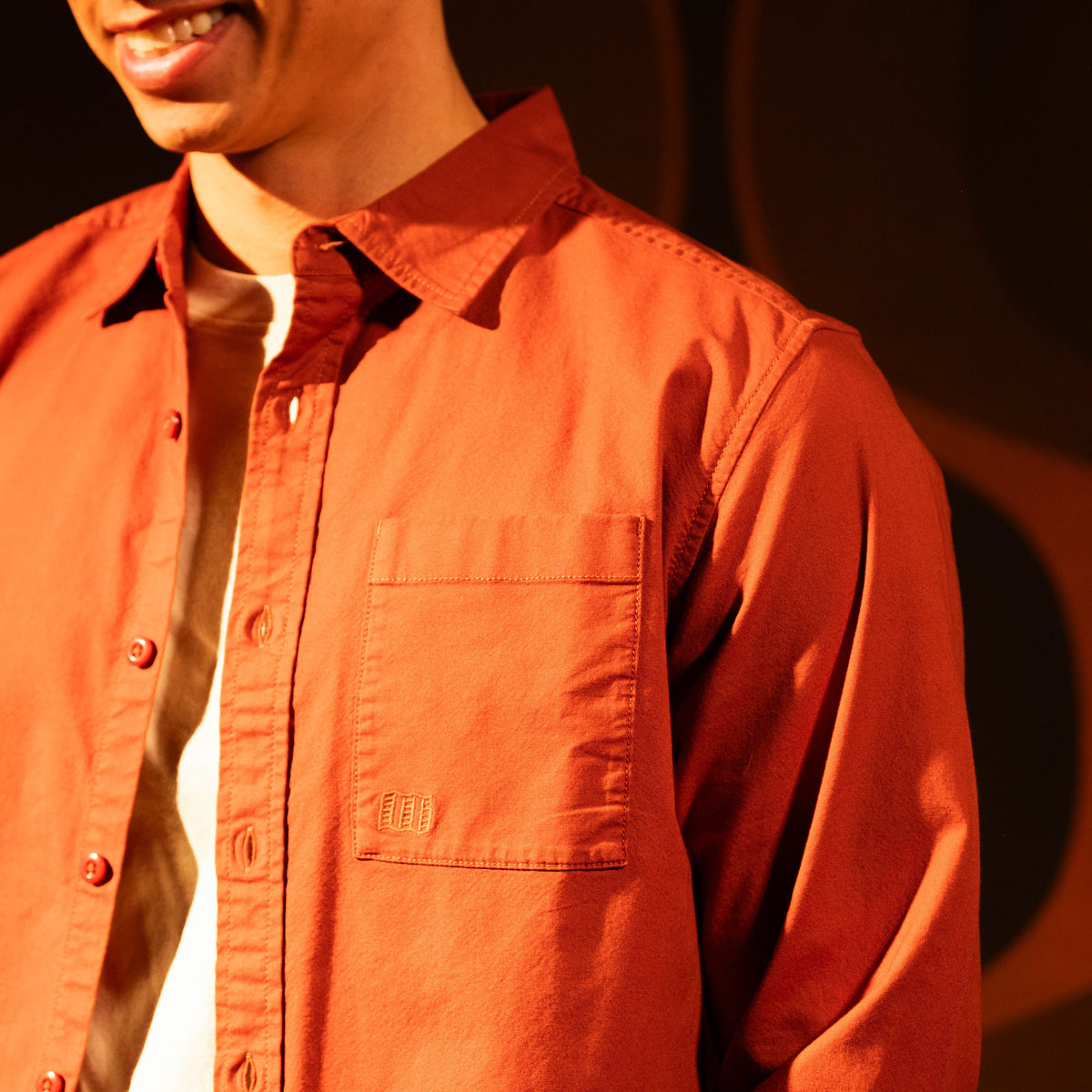 General model shot of Topo Designs Desert Shirt - Men's in "Terracotta"