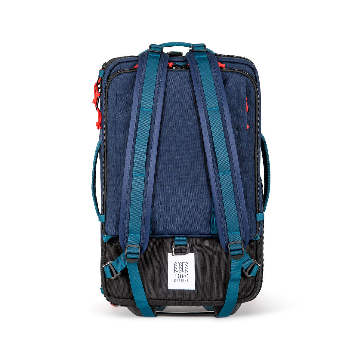 Shot of backpack straps on Topo Designs Global Travel Bag Roller durable carry-on convertible laptop rolling suitcase in Navy blue.