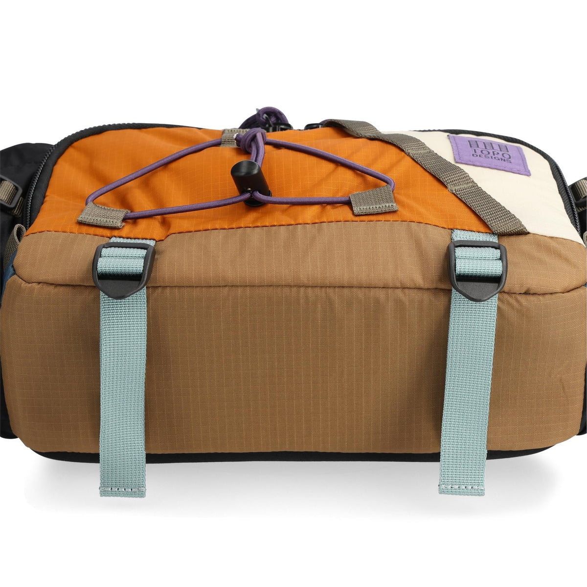 General Detail shot of Topo Designs Mountain Hydro Hip Pack in "Pond Blue / Spice"