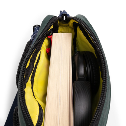 General interior view of Topo Designs Block Bag in "Forest / Bone White"