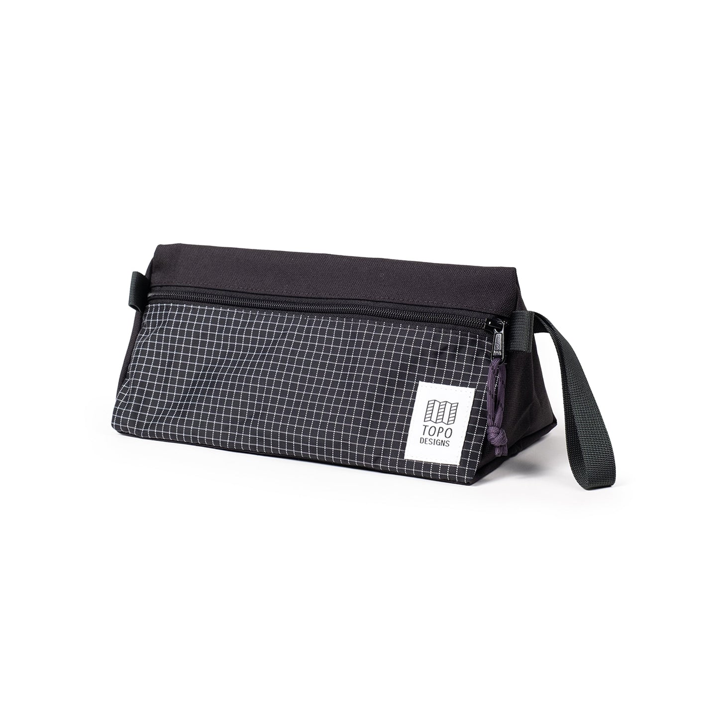 Quarter View of Topo Designs Dopp Kit in "Black / White Grid"