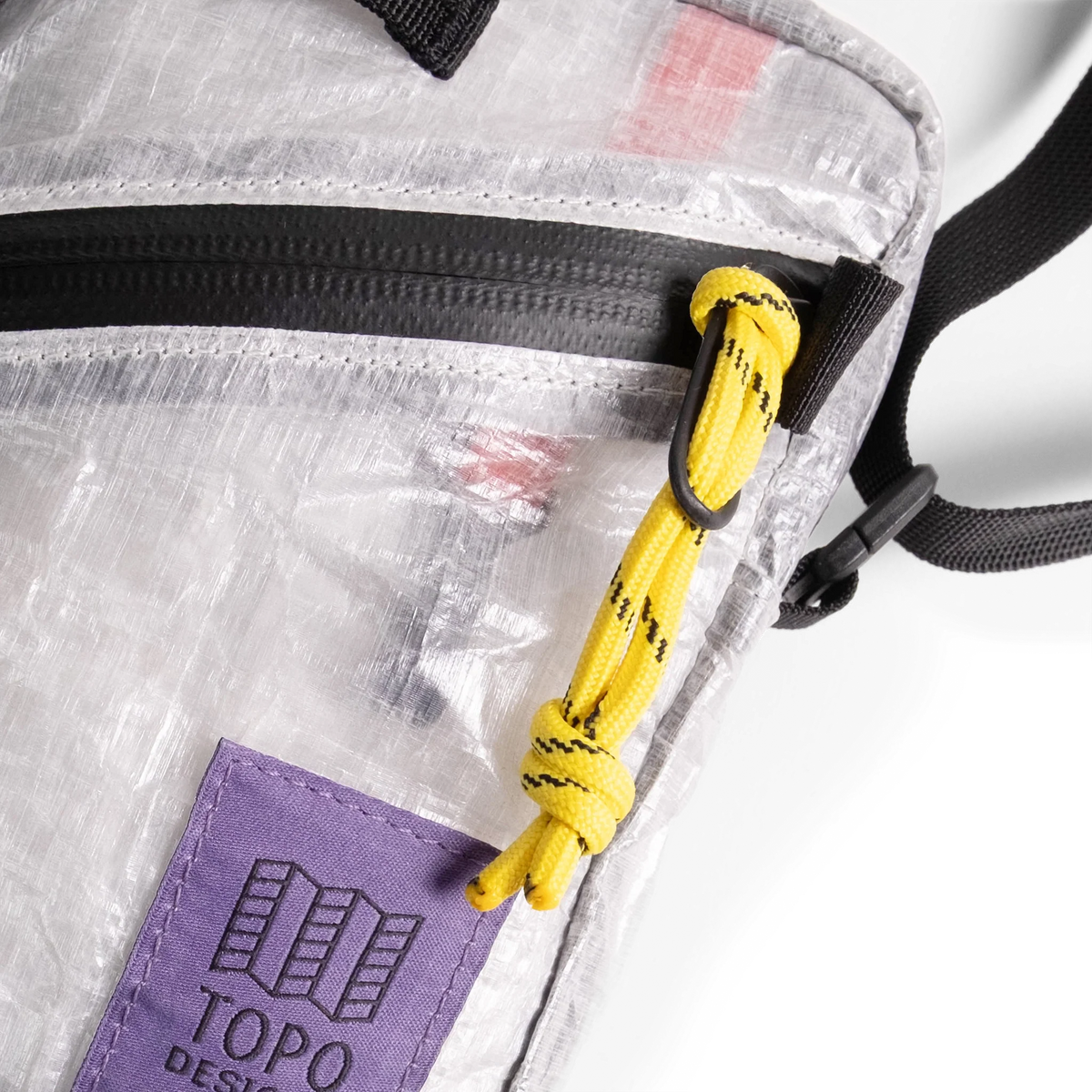 Front zipper detail image of Dyneema® Mini Shoulder Bag in "White"