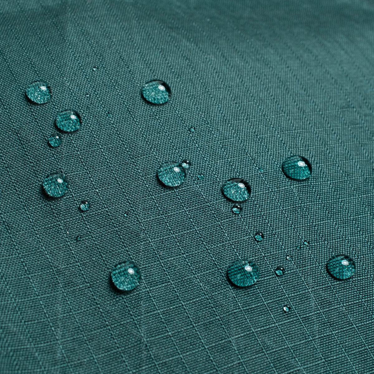 General shot of Topo Designs Global Pro Travel Tote showing water droplets on waterproof fabric