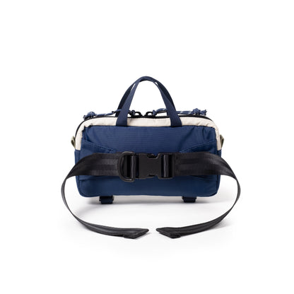 Back View of Topo Designs Mini Quick Pack in "Forest / Bone White"