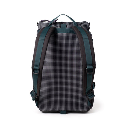 Back View of Topo Designs Rover Pack Classic in "Black / White Grid"
